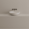 Agape Spoon XL Aufsatzwaschbecken, definierend Luxus und Stil neu, im minimalistisch-modernen Stil mit matter Wandarmatur. Dieses Aufsatzwaschbecken ist verfügbar in weißem Cristalplant® biobased.